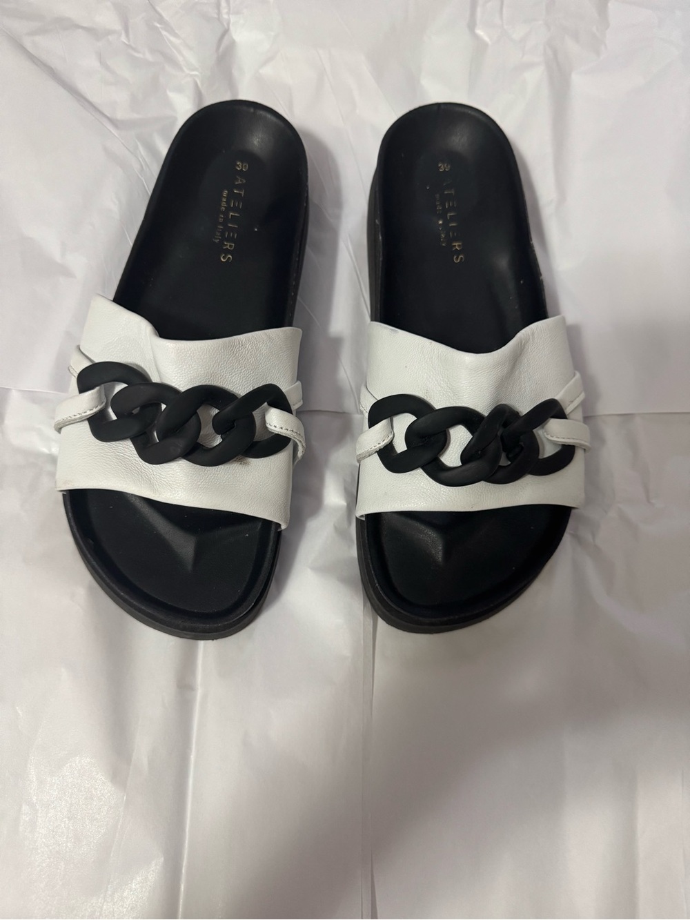ATELIERS White Leather Slide Sandals with Black Chain Detail